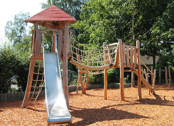 Wooden play combination with slide