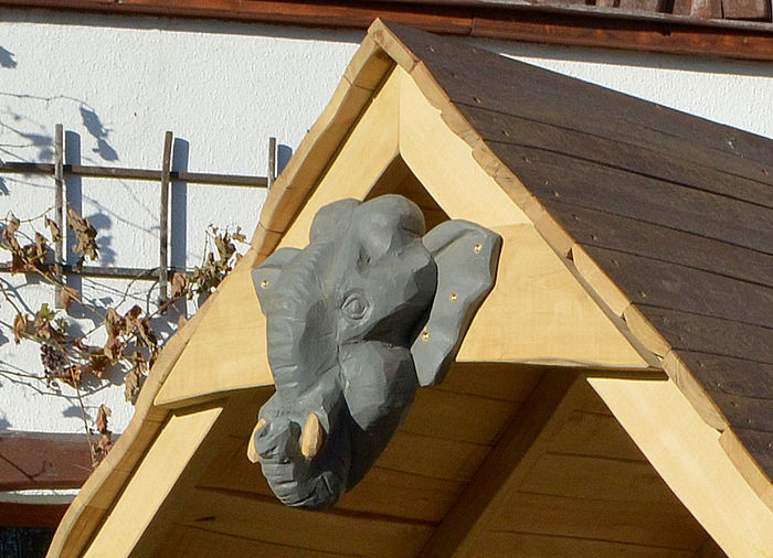 Detail elephant made of Robinia wood