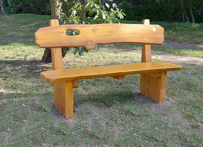 Rustic wooden bench made of robinia wood