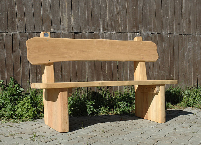 Rustic wooden bench with backrest