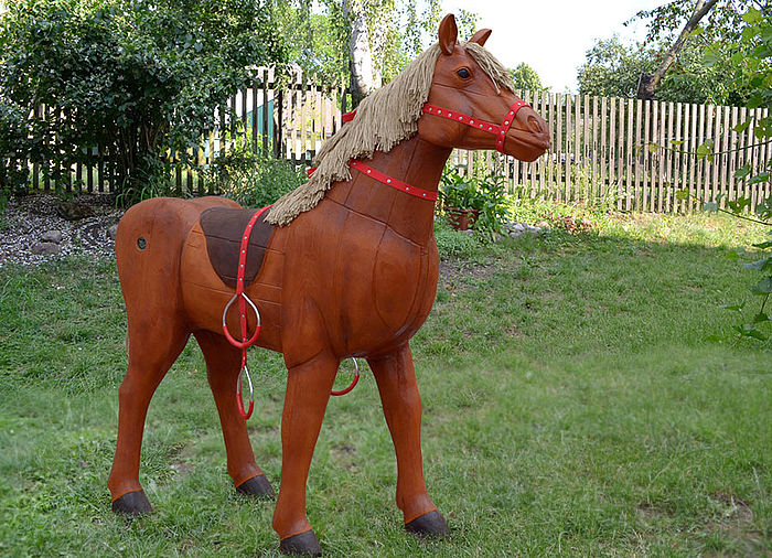 Play horse made of wood for playground