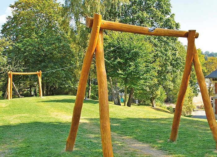 Zip wire suitable for playground