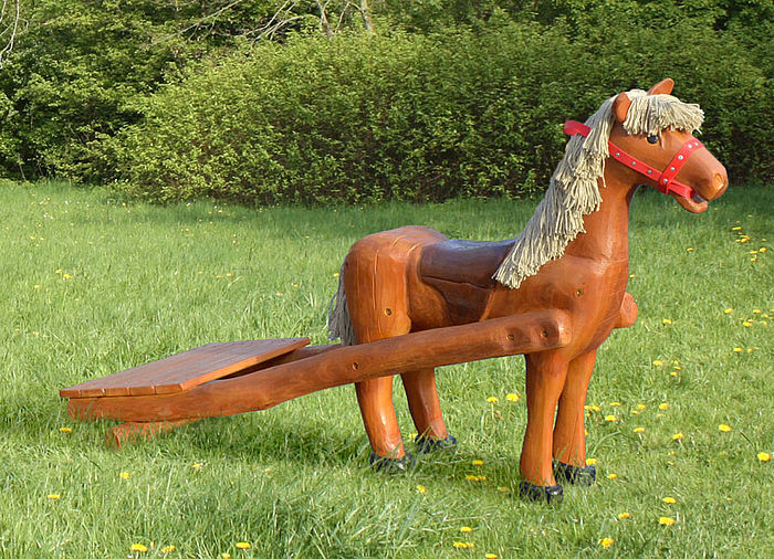Play sculpture horse with drag made of wood
