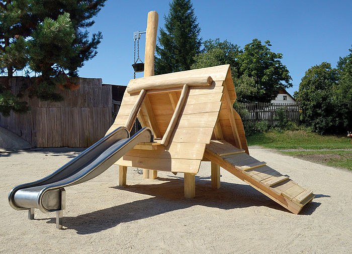 Playhouse with slide and sandlift