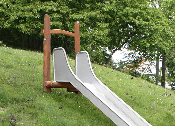 Slide platforms for fixing the slides on hillsides
